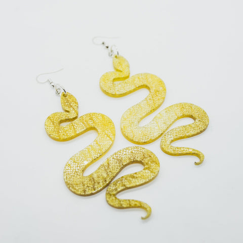 Yellow snake earrings by Smells Like Crime, Co.