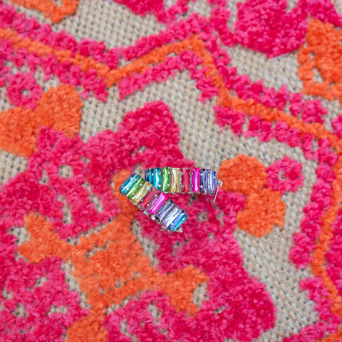 Rainbow rhinestone hoop earrings.