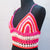 Pink and red crocheted halter top.
