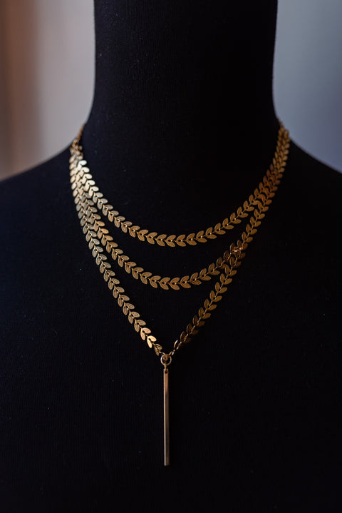 Grecian layered gold chain necklace.