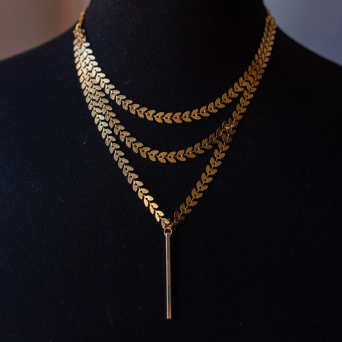 Grecian layered gold chain necklace.