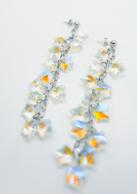 Jeweled star earrings.