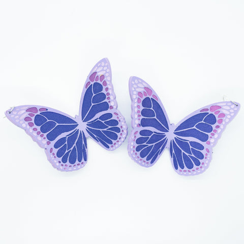 Purple butterfly earrings.