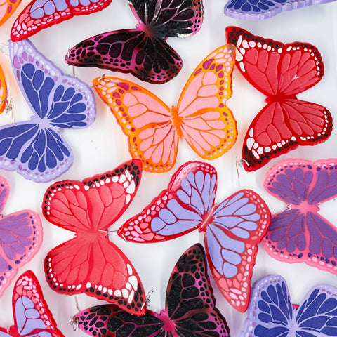 Colorful butterfly earrings.
