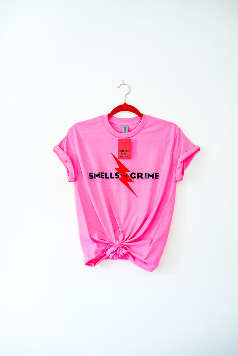 Smells Like Crime pink logo tee