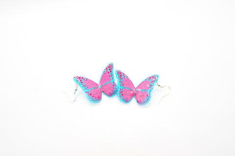 Blue and pink butterfly earrings by Smells Like Crime, Co.