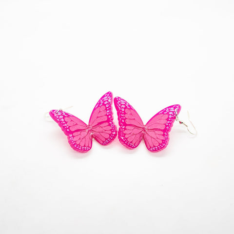 Fuchsia butterfly earrings by Smells Like Crime, Co.