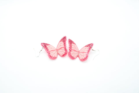Pink butterfly earrings by Smells Like Crime, Co.