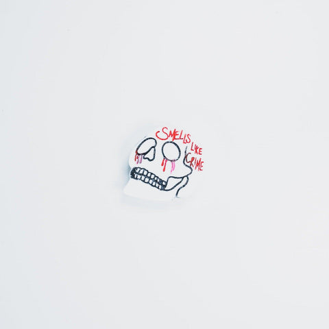 Crying skull pin by Smells Like Crime