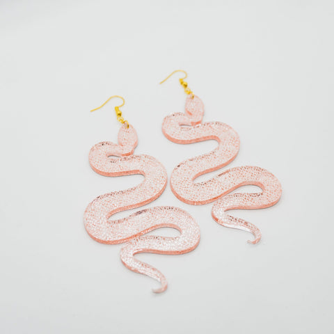 Pink snake earrings by Smells Like Crime, Co.