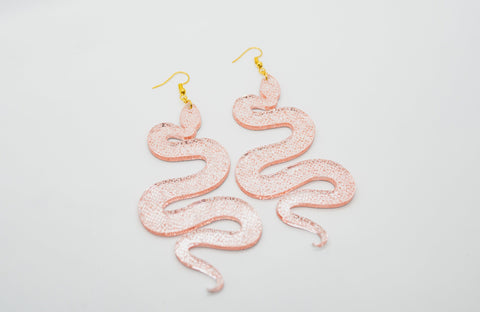 Pink snake earrings by Smells Like Crime, Co.